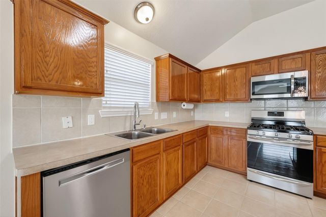 9830 Lynette Falls Drive, Houston, TX 77095