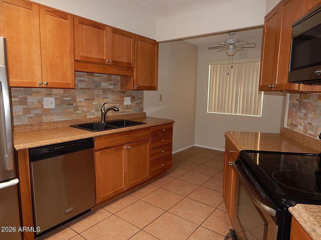 10978 W COGGINS Drive, Sun City, AZ 85351 — photo 5
