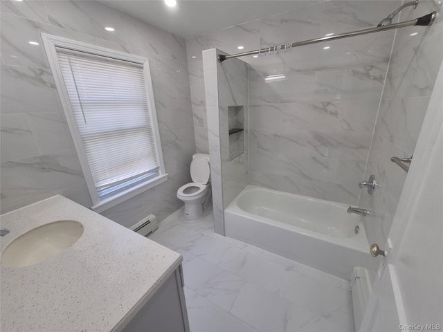 86 Woodlawn Avenue, Valley Stream, NY 11581