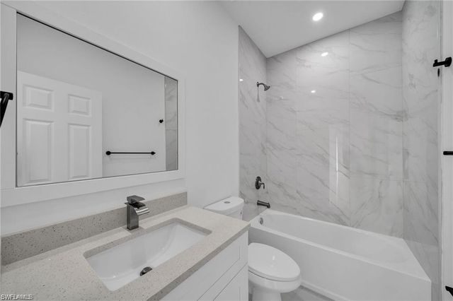 438 Poplar ST, Lehigh Acres, FL 33974