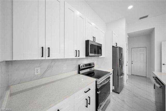 438 Poplar ST, Lehigh Acres, FL 33974