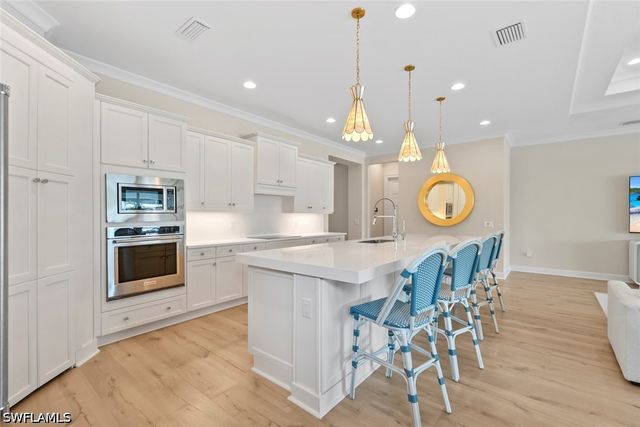 8783 Calypso CT, Naples, FL 34112