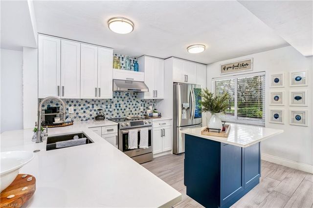 3001 Sandpiper Bay Circle, Naples, FL 34112
