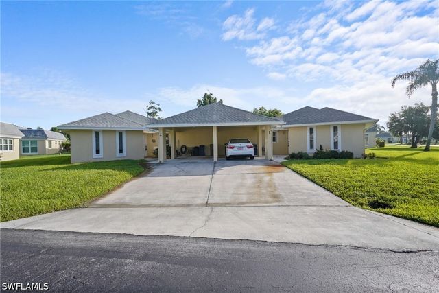 2 E Greens CIR, Lehigh Acres, FL 33936