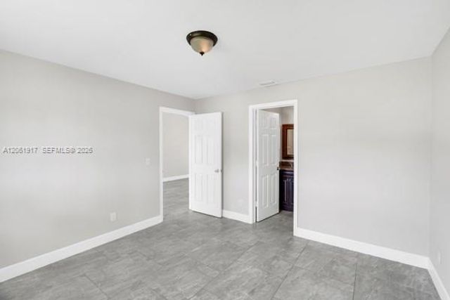 909 SALLY AVE NE, Lehigh Acres, FL 33971