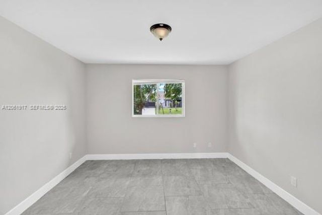 909 SALLY AVE NE, Lehigh Acres, FL 33971