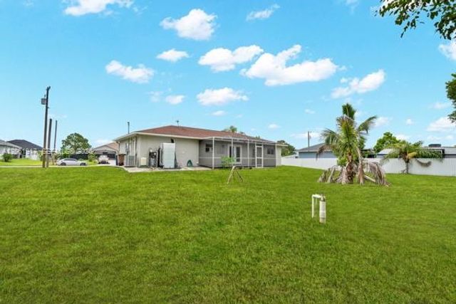 909 SALLY AVE NE, Lehigh Acres, FL 33971