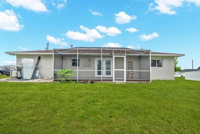 909 SALLY AVE NE, Lehigh Acres, FL 33971