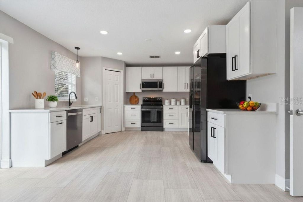 Image 45 of property listing at 2735 HOWLAND BOULEVARD, Deltona, FL 32725