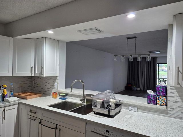 9717 Sills Drive E 102, Boynton Beach, FL 33437