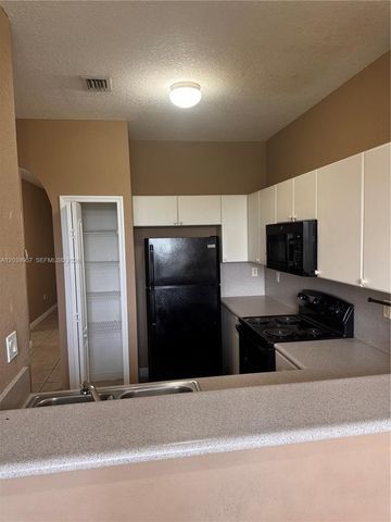 7070 NW 177th St 203-10, Hialeah, FL 33015