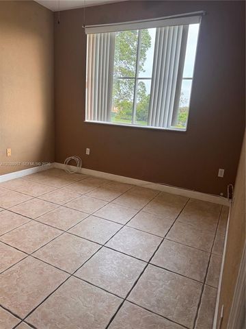 7070 NW 177th St 203-10, Hialeah, FL 33015