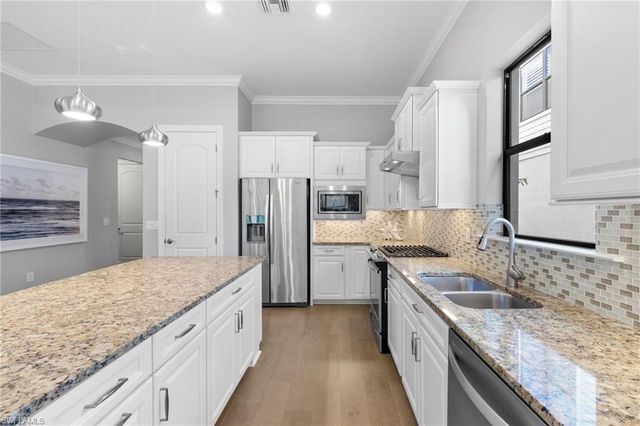 9410 Whooping Crane WAY, Naples, FL 34120