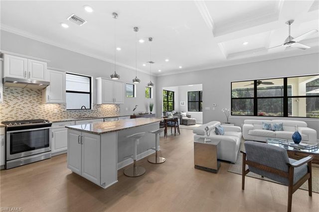 9410 Whooping Crane WAY, Naples, FL 34120