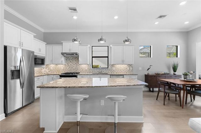 9410 Whooping Crane WAY, Naples, FL 34120