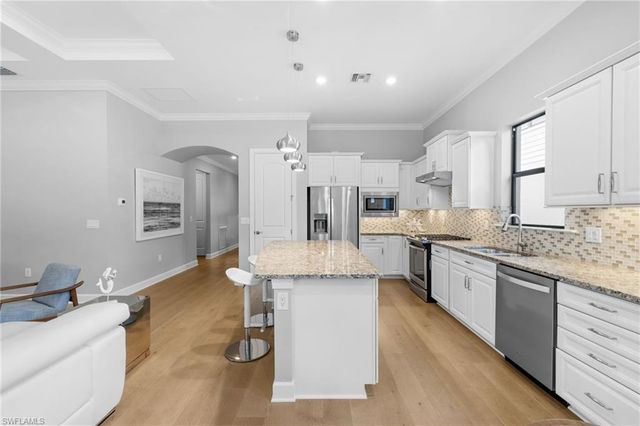 9410 Whooping Crane WAY, Naples, FL 34120