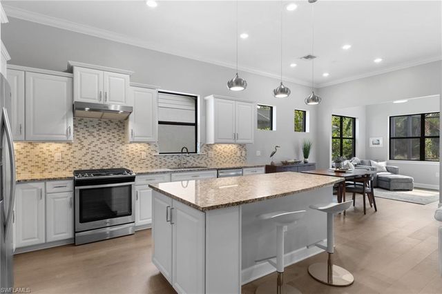 9410 Whooping Crane WAY, Naples, FL 34120