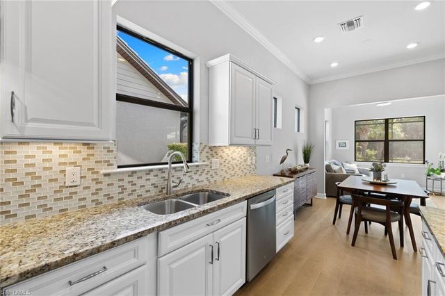 9410 Whooping Crane WAY, Naples, FL 34120