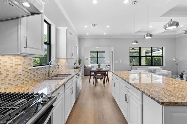 9410 Whooping Crane WAY, Naples, FL 34120