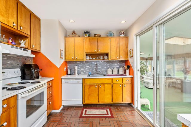 59 Homewood Drive, Hampton Bays, NY 11946