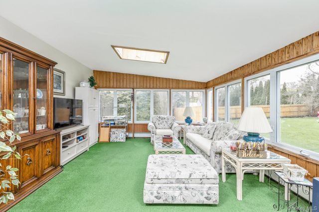 59 Homewood Drive, Hampton Bays, NY 11946