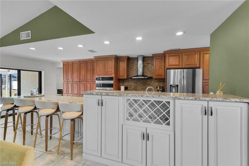 Image 11 of property listing at 102 SE 42nd ST, Cape Coral, FL 33904