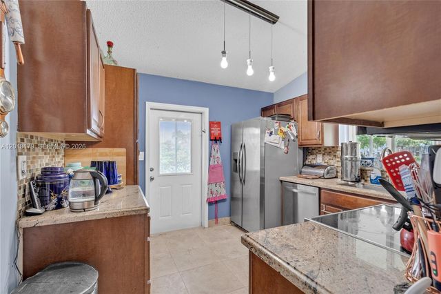 19903 NW 67th Court, Hialeah, FL 33015