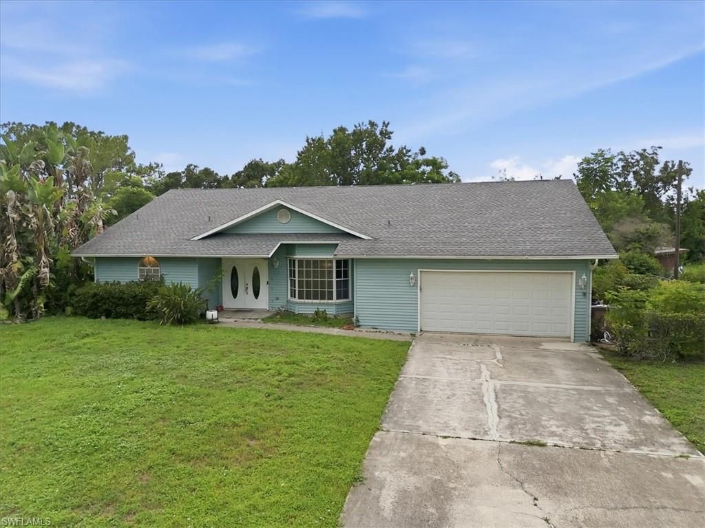 115 Robert AVE, LEHIGH ACRES, FL 33936 — exterior