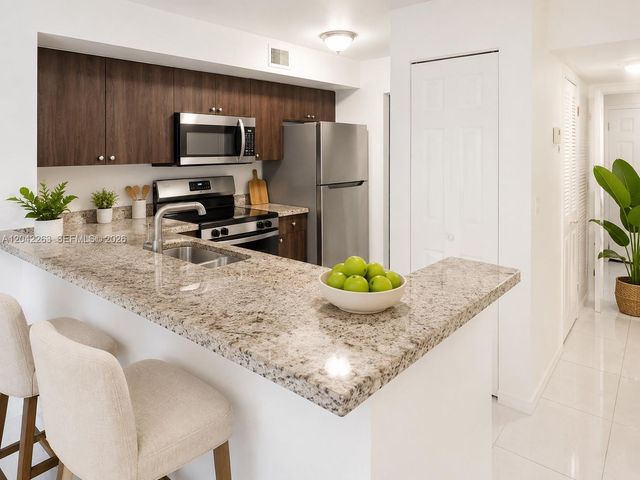 11177 SW 8th Street 208, Pembroke Pines, FL 33025