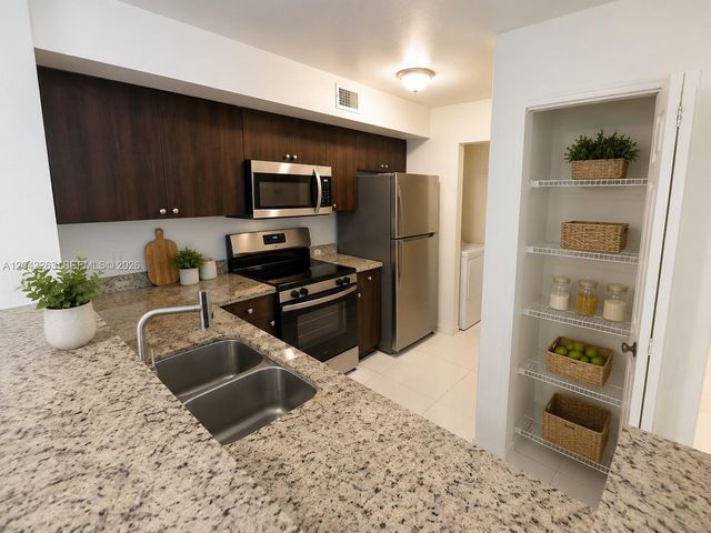 11177 SW 8th Street 208, Pembroke Pines, FL 33025