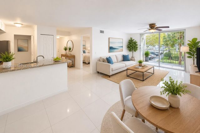 11177 SW 8th Street 208, Pembroke Pines, FL 33025