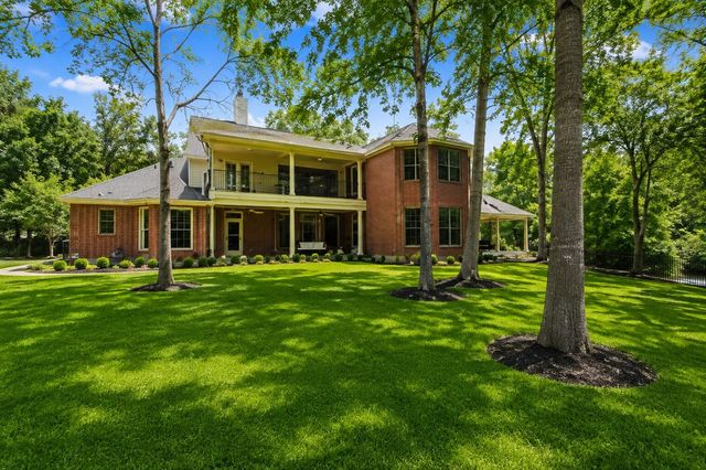 7 Pastoral Pond Circle, The Woodlands, TX 77380