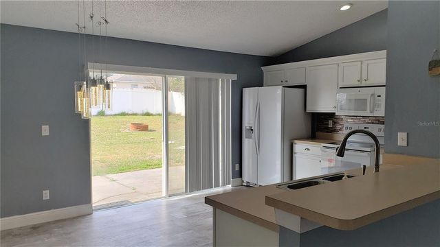 5141 PINE NEEDLE DRIVE, Mascotte, FL 34753