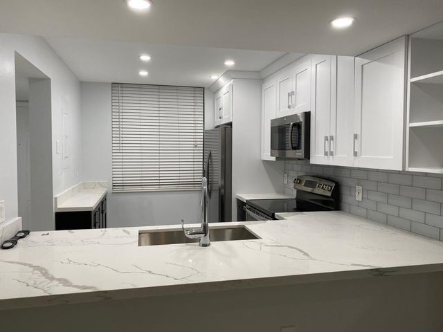 1520 WHITEHALL Drive 202, Davie, FL 33324