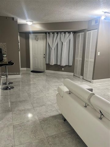 8710 SW 3rd St 104, Pembroke Pines, FL 33025