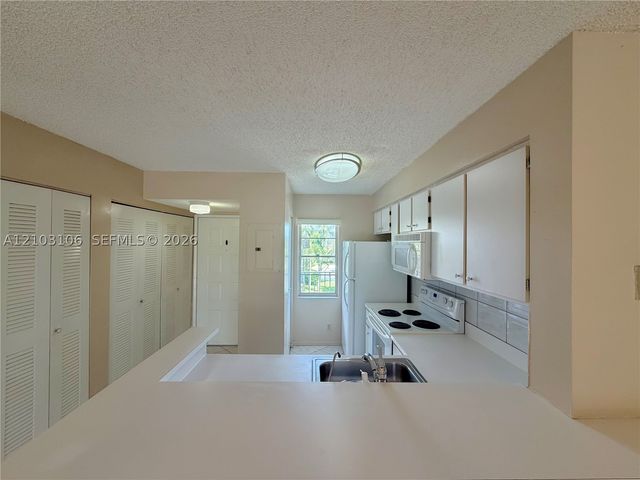 2230 N Cypress Bend Dr 308, Pompano Beach, FL 33069