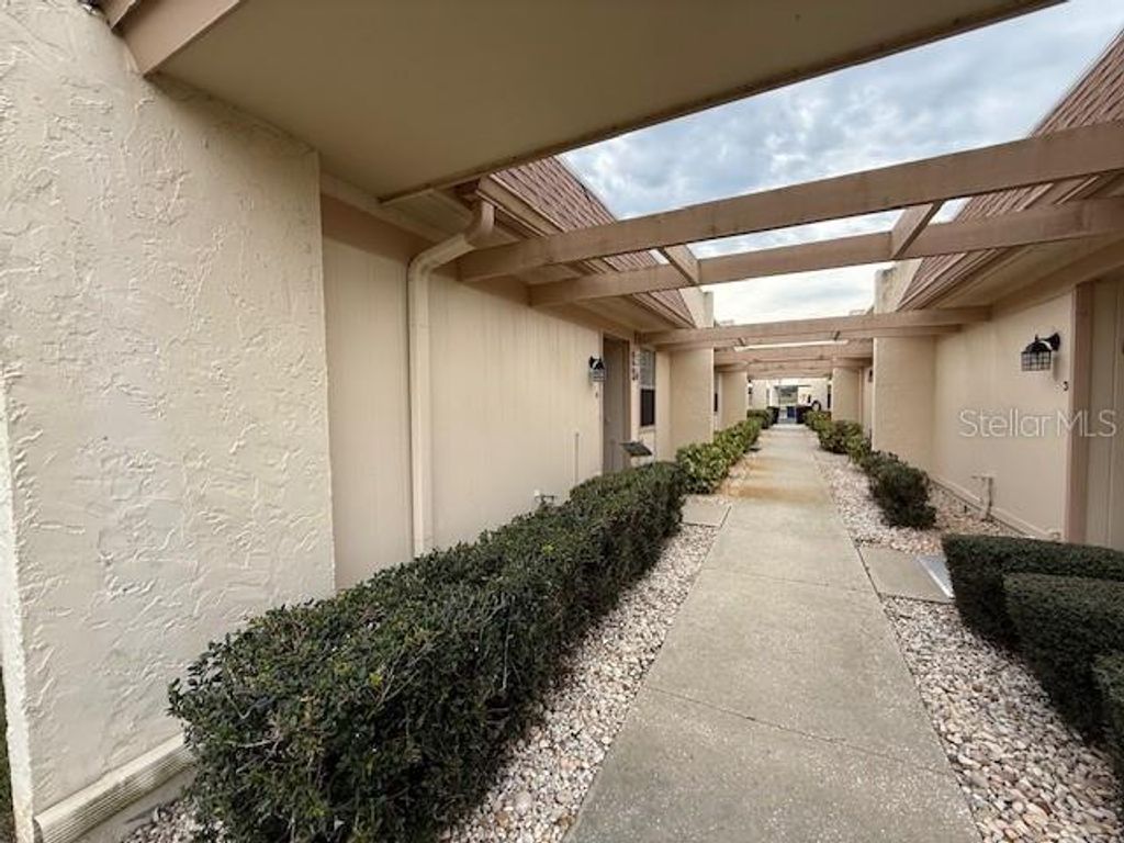 Image 2 of property listing at 11140 CARRIAGE HILL DRIVE 4, Port Richey, FL 34668