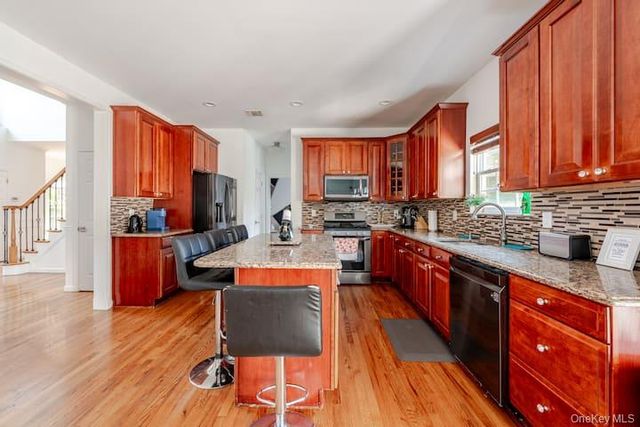 1 Brittany Court, Ridge, NY 11961