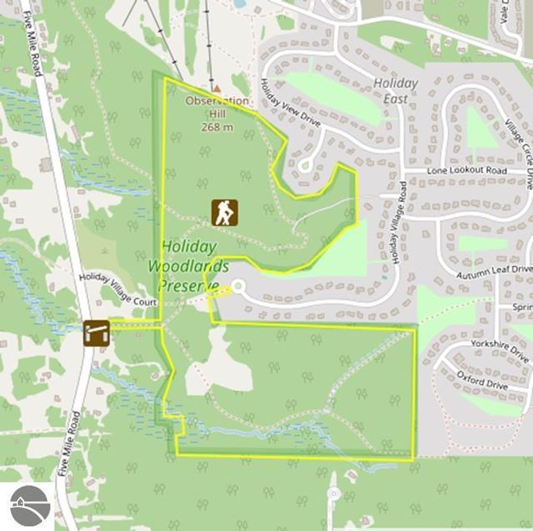Map of Holiday Woodlands Preserve, highlighting trails and surrounding residential areas near Traverse City, MI, relevant to property listing at 3423 Holiday Ridge Road.
