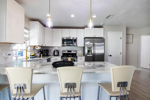 133 SE 2nd, Cape Coral, FL 33990