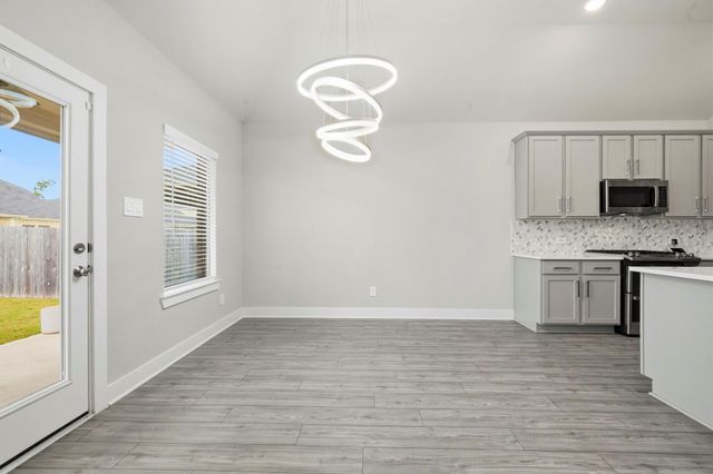 9727 Migrant Hawker Court, Conroe, TX 77385