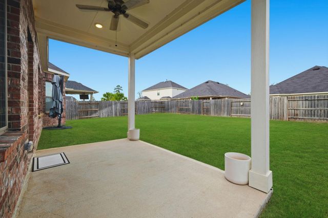 9727 Migrant Hawker Court, Conroe, TX 77385