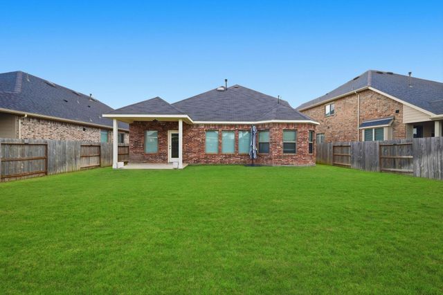 9727 Migrant Hawker Court, Conroe, TX 77385