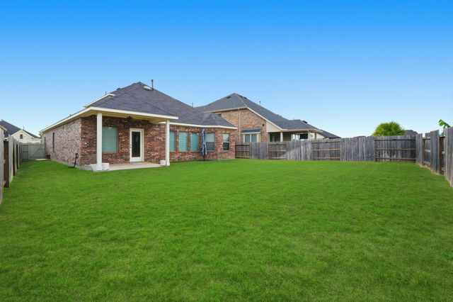 9727 Migrant Hawker Court, Conroe, TX 77385