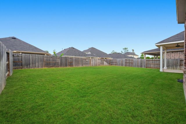 9727 Migrant Hawker Court, Conroe, TX 77385