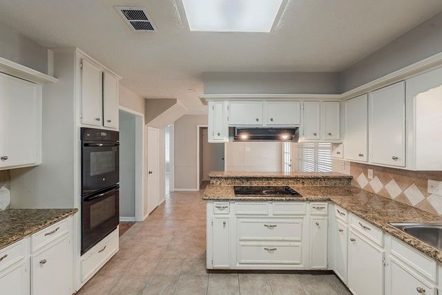 7803 Hurst Forest Drive, Humble, TX 77346
