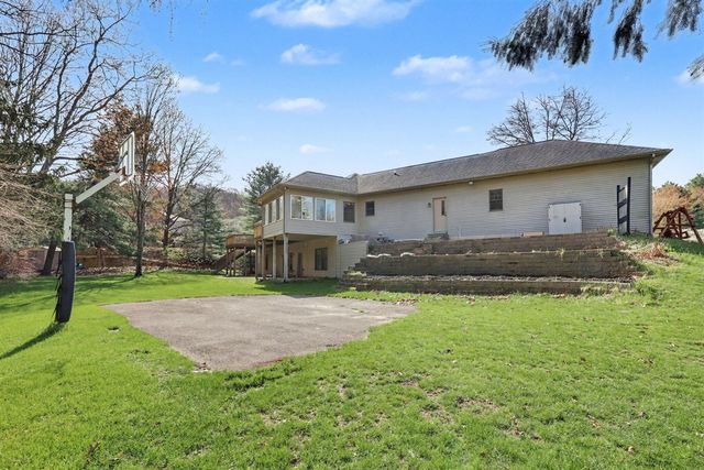 2864 Riverwoods Drive, Rockford, MI 49341