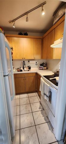 5050 NW 7th St 210, Miami, FL 33126