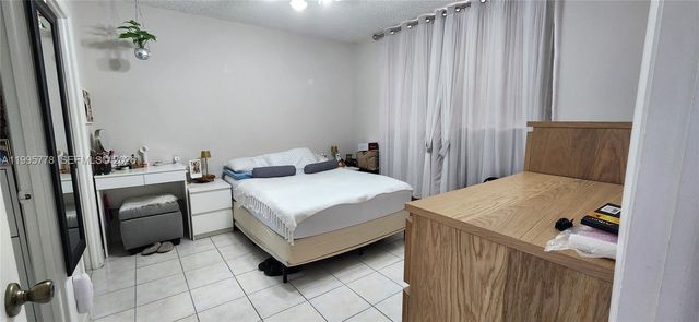 5050 NW 7th St 210, Miami, FL 33126