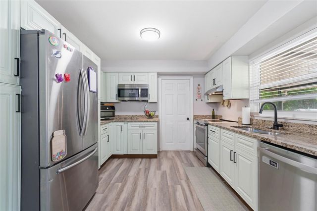 10214 N WOODMERE ROAD, Tampa, FL 33617